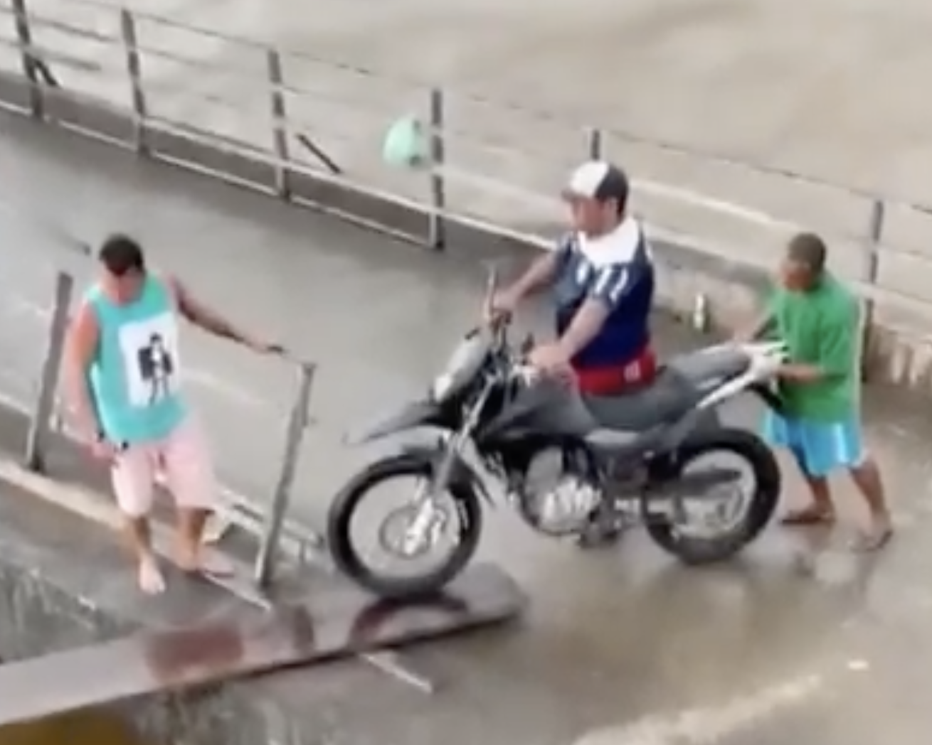 WCGW pushing a motorcycle into a boat