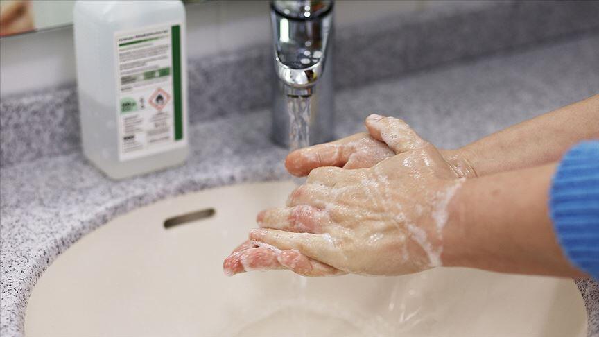 143513152-washing-hands-with-soap-and-hot-water